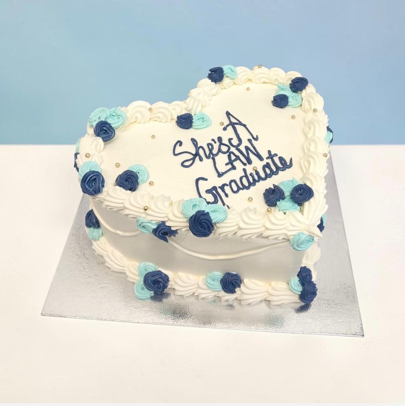 Heart-Shaped Law Graduate Cake